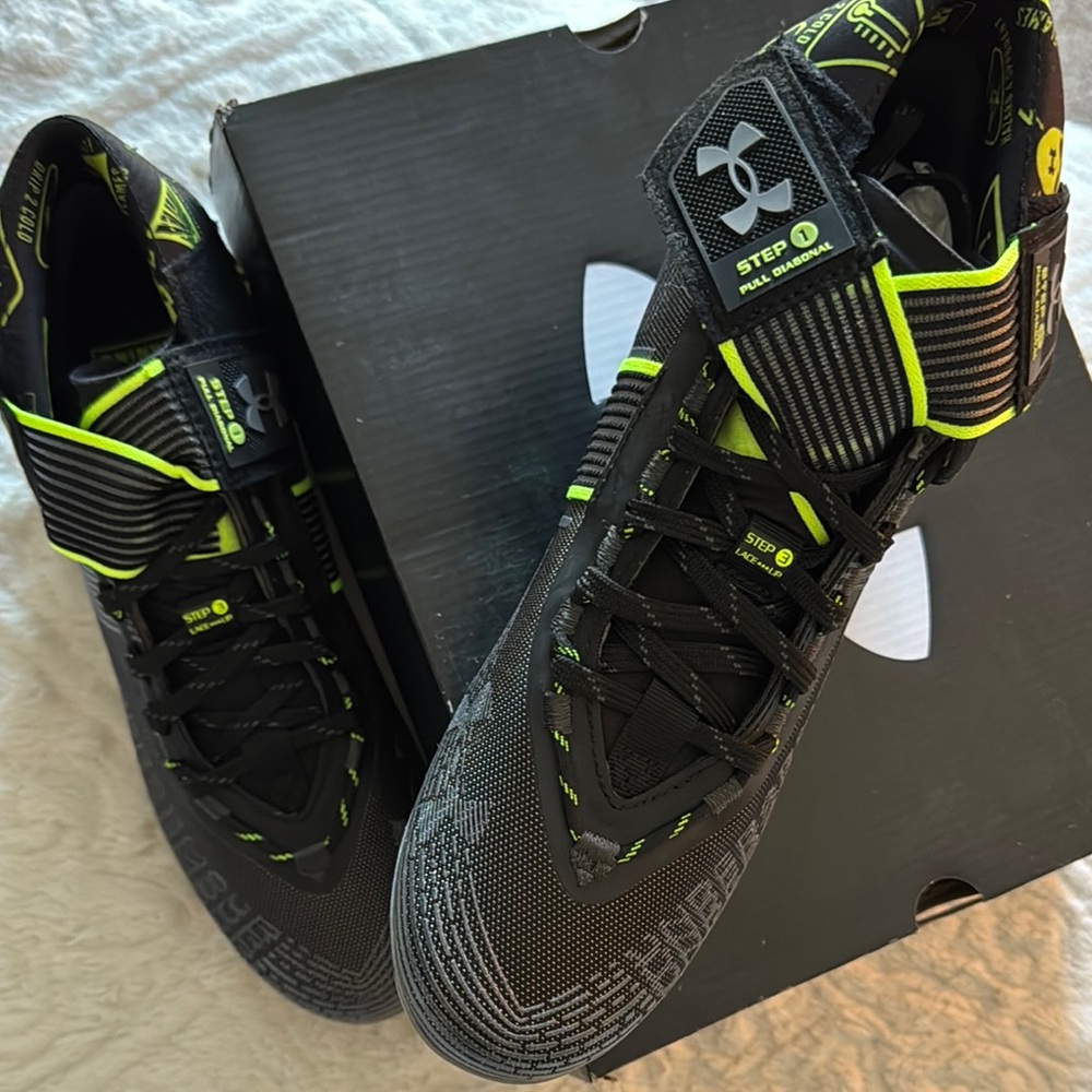 Under Armour Men's Black Cleats size 9.5. Brand New with original box.